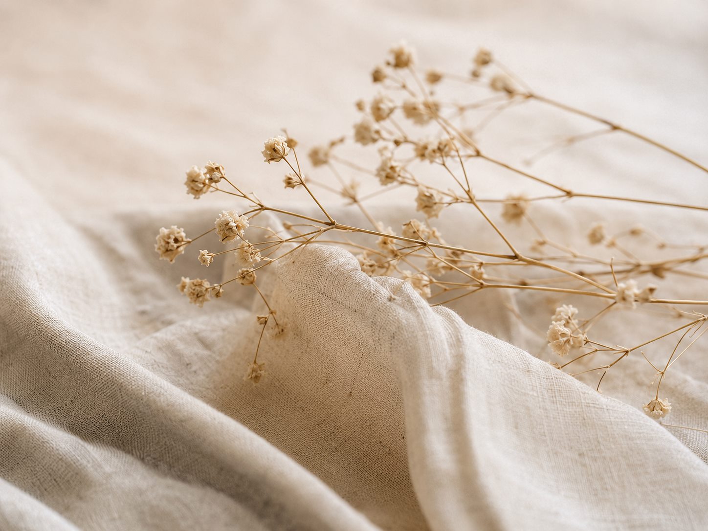 Soft linen and dried florals